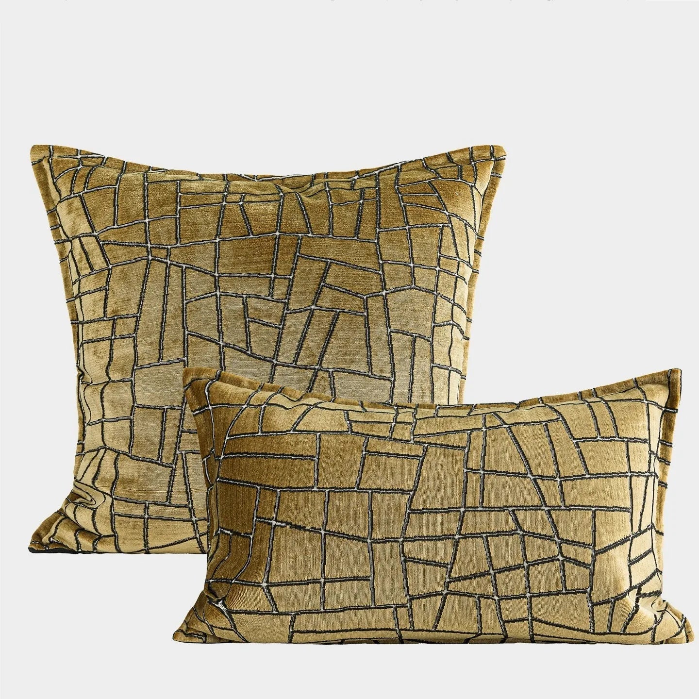 Tuhao gold geometric abstract pattern on a velvet square cushion cover and lumbar pillow.