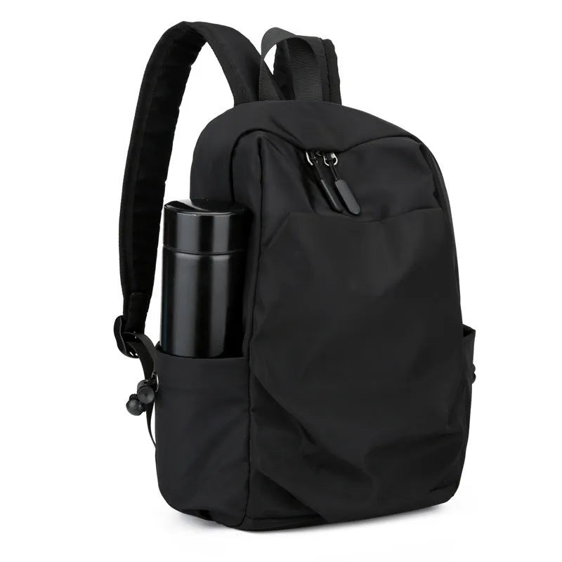 Oxford cloth backpack for men in black or gray with breathable design and polyester cotton lining