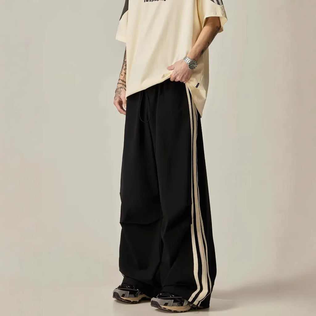 Black men's wide leg climbing pants with high waist and long straight-leg style made of polyester