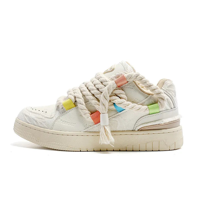 Creamy white retro skateboard shoes with lace-up front and platform sole