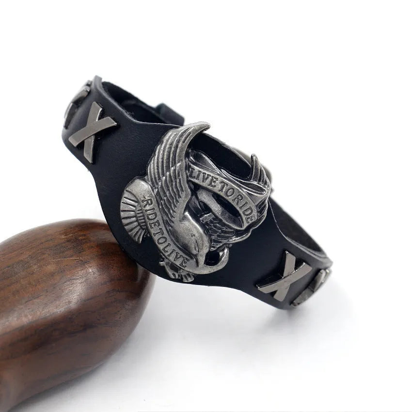 Black leather eagle watch-buttom bracelet with geometric design measuring 26cm length