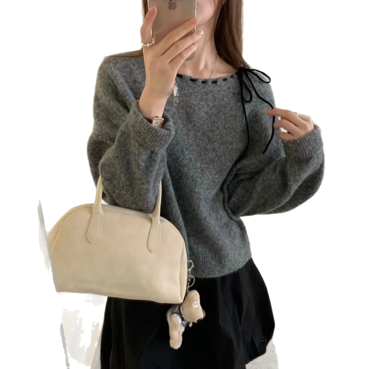 Women's loose-fit knit pullover sweater in black or grey colour with long sleeves