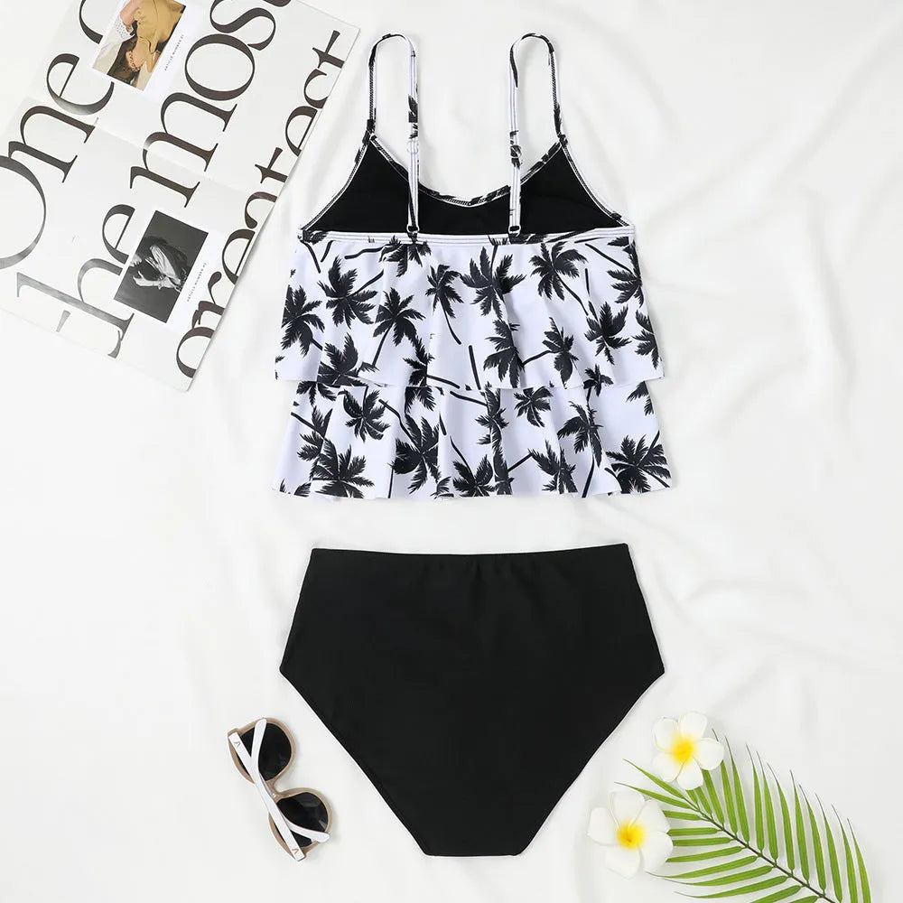 High-waist printed swimsuit in black with coconut tree pattern design