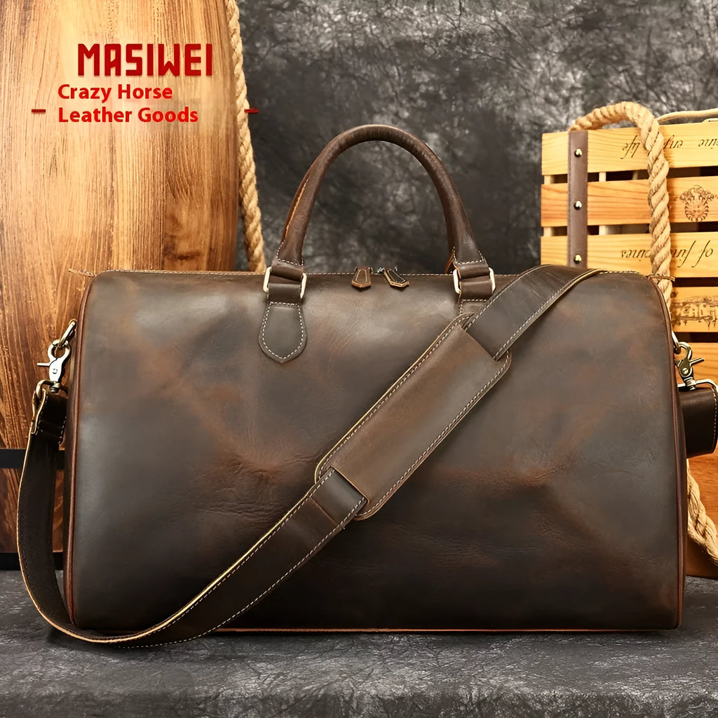 Men's large leather crossbody bag in black with adjustable shoulder strap showing interior polyester cotton lining