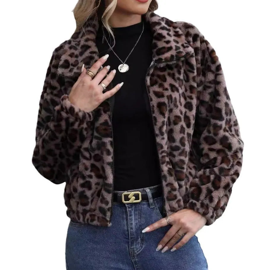 Women's loose-fitting leopard print coat with full zipper and raglan sleeves on a hanger