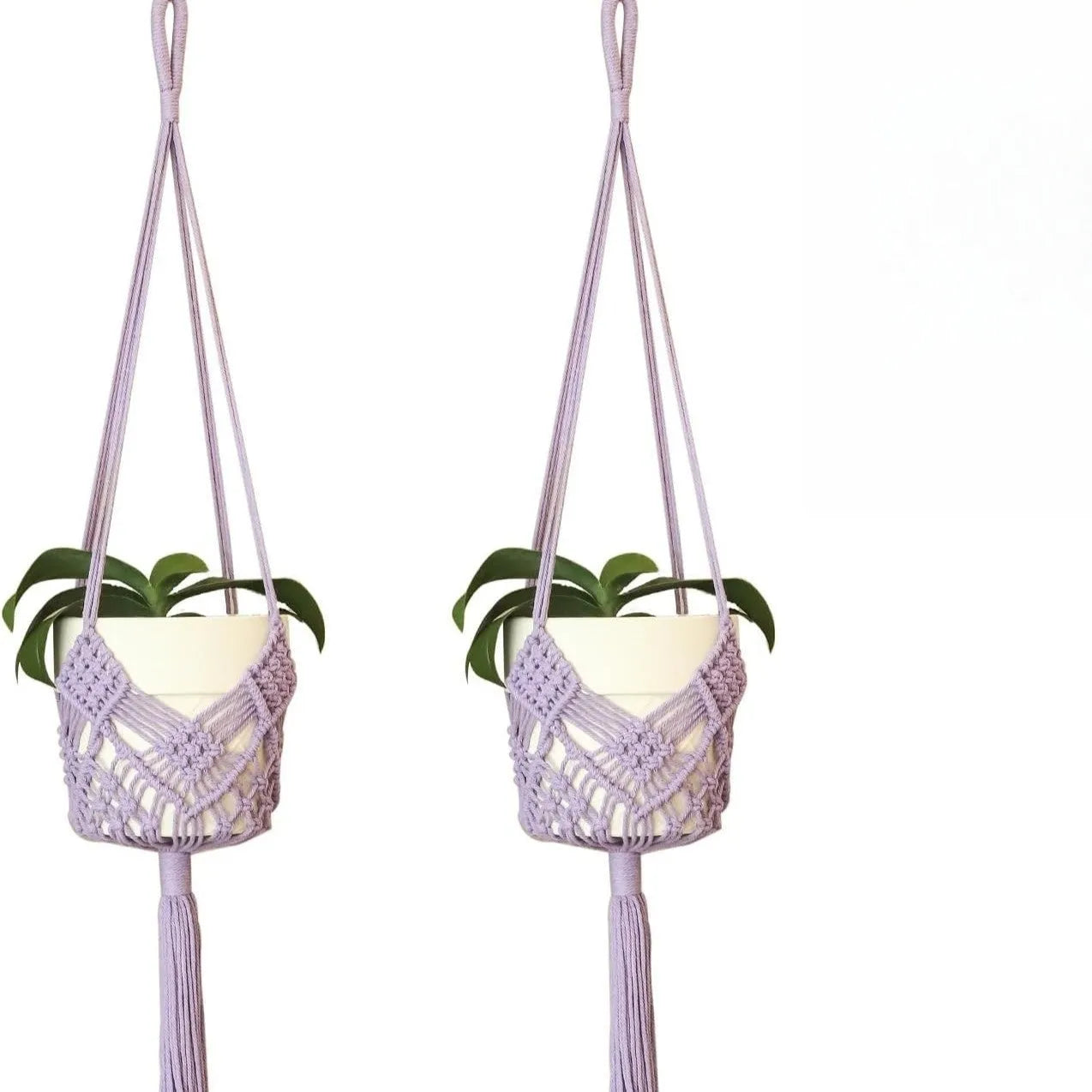 Hand-woven brown polyester cotton net pocket extension cord on a grey flower pot.