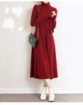 Turtleneck knit dress with elastic waist and loose big hem in solid colour