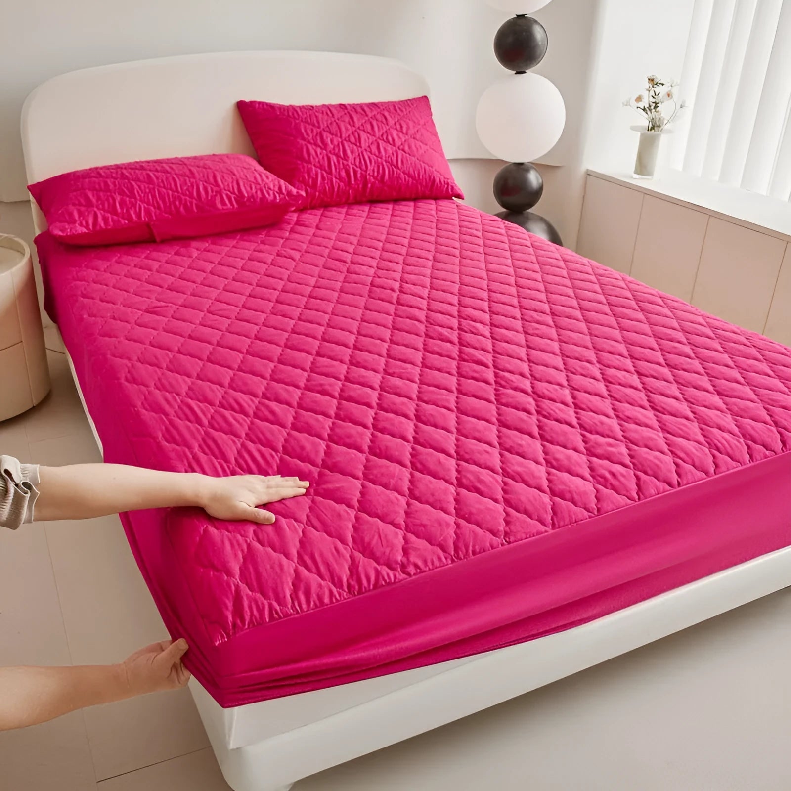Diamond lattice quilted waterproof mattress protector in bamboo fibre, shown in a solid colour.