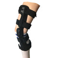 Black anterior ligament knee pad showing multi-material construction and sizing tags for left and right knees.