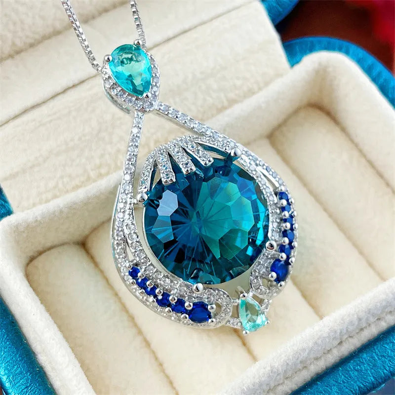 Blue geometric crystal pendant necklace with water wave chain, women's jewellery with fireworks-cut gems