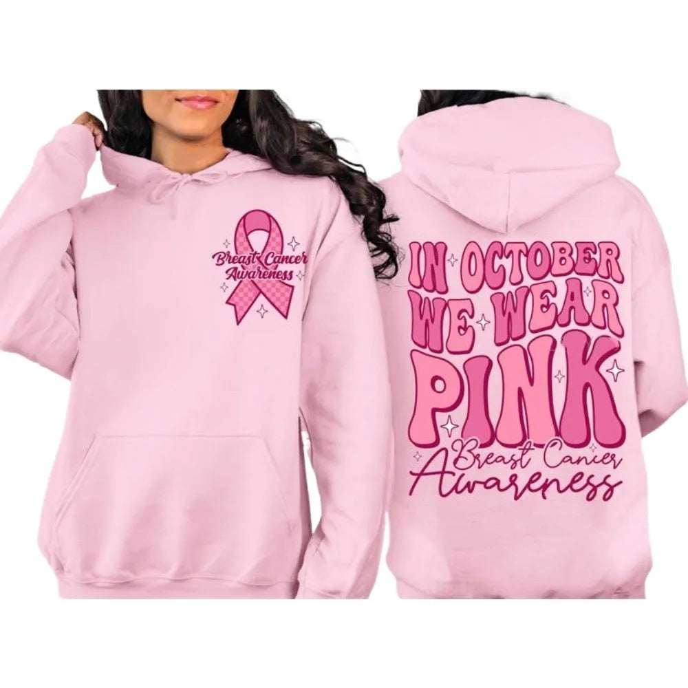 Breast cancer awareness pullover hoodie with retro art print in pink, featuring side seam pockets.