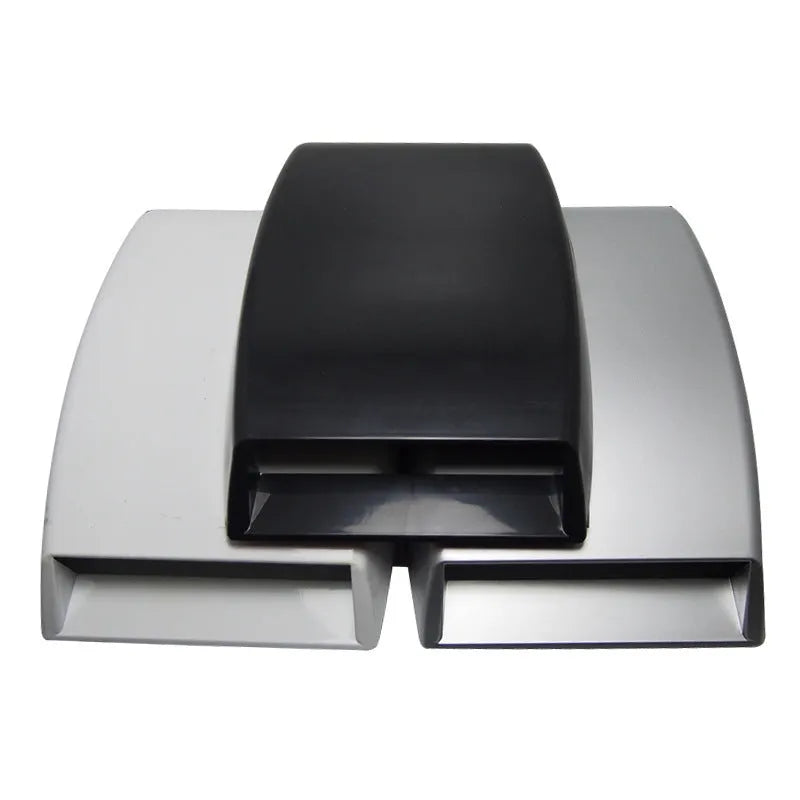 Black, white, and silver ABS plastic decorative simulation air vent for car interior styling.