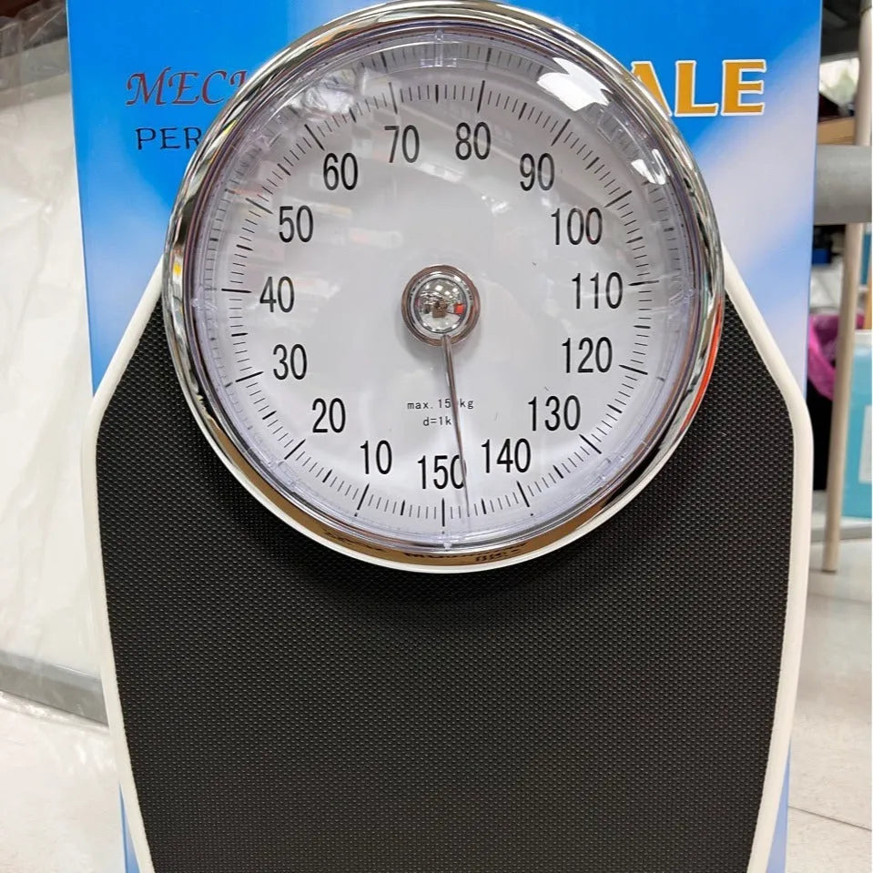 Black mechanical bathroom scale with large analogue dial on 47x35cm platform.