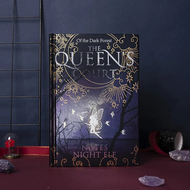 Blue A5 hardcover notebook with luminous retro design, open to show full-colour illustrated pages.
