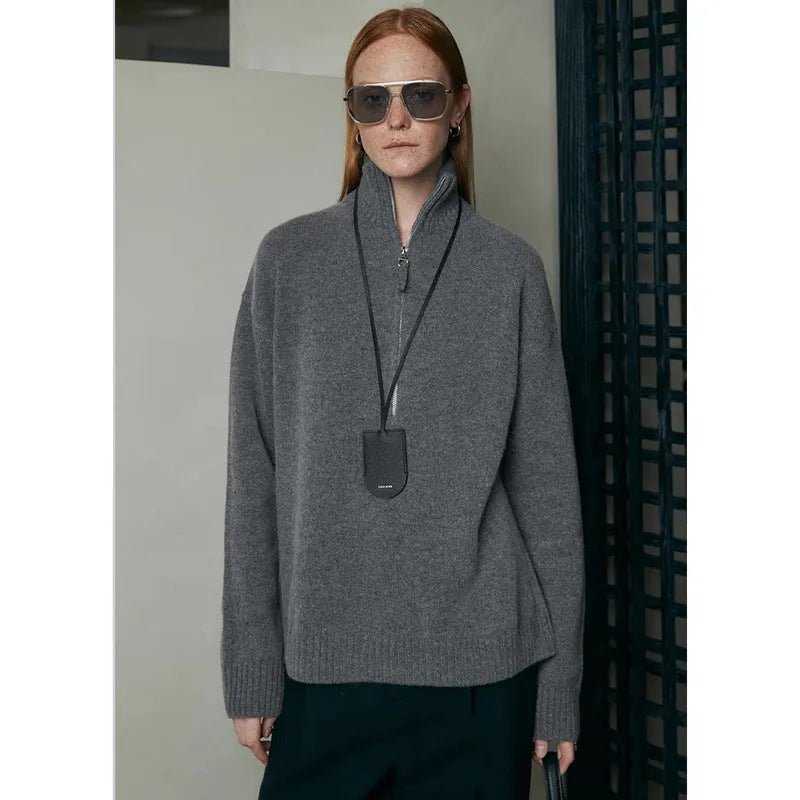Wool bandage dress with loose lapels in black and mountain rain grey, long sleeves, sizes M and L.