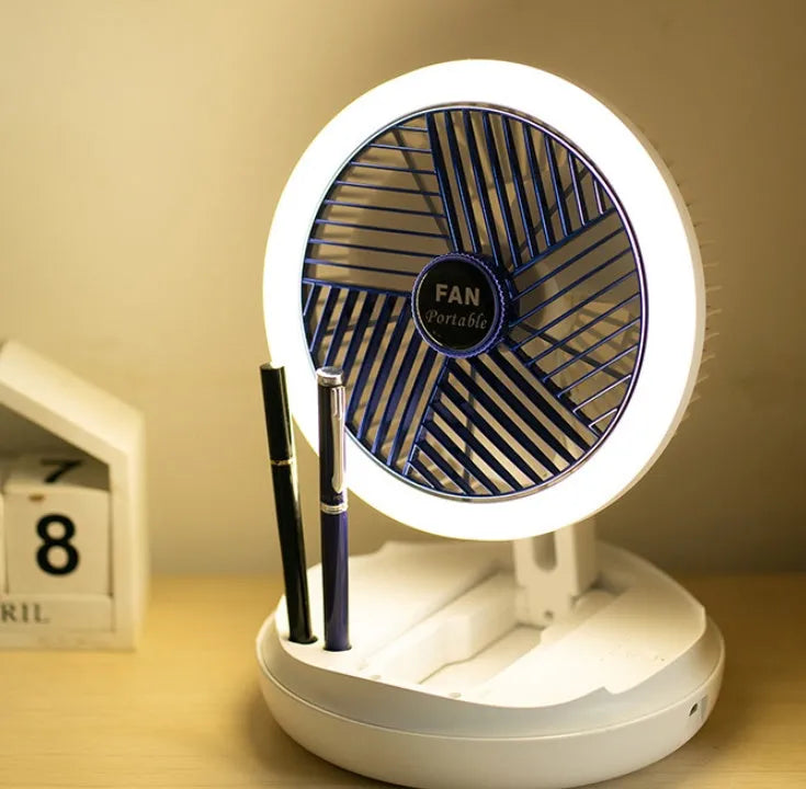 Blue foldable USB desk fan with LED light showing adjustable head and pen holder