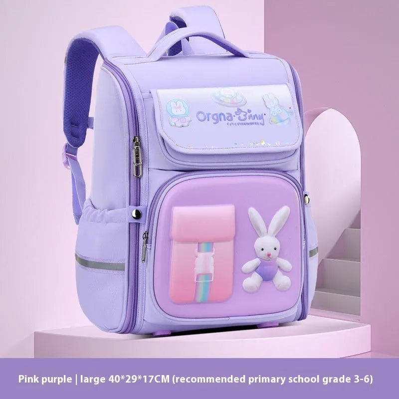 Children's cartoon backpack in Rabbit or Spaceman print with airpillow straps, shown in pink, purple, blue green, or blue red.