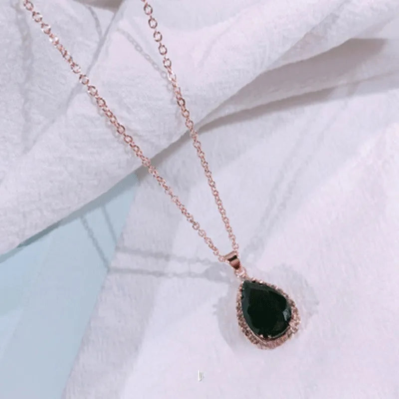 Drop shape women's necklace with rose gold electroplating and rhinestone geometric design in pink colour