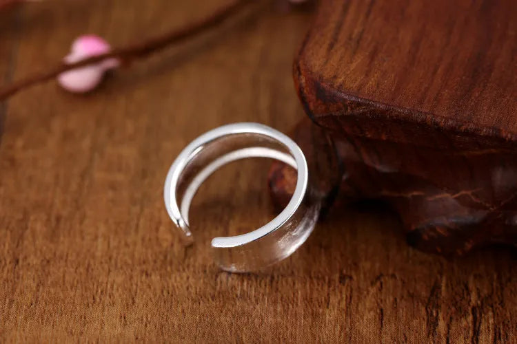 Open ring sterling silver with frosted finish and adjustable opening, geometry ornament