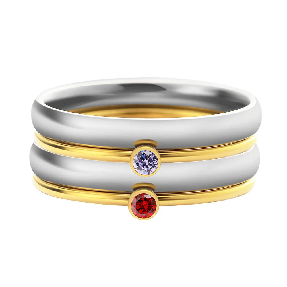 December birthstone geometric ring with gold engraved lettering on titanium steel band