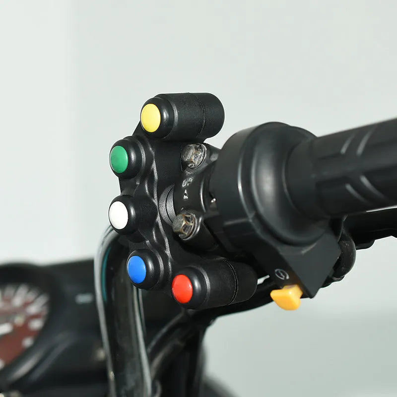 Plastic five-position vehicle switch with red, yellow, blue, green, and white buttons, showing 52cm cable and 2.2cm mount.