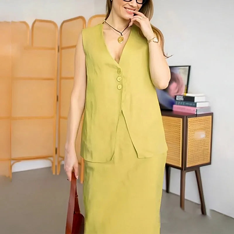A woman's casual two-piece suit with a sleeveless loose vest and a long matching skirt.