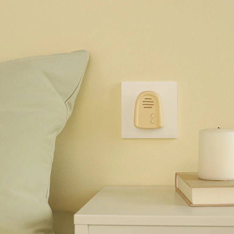 Wireless plug-in doorbell for household use in milky yellow and white colour options