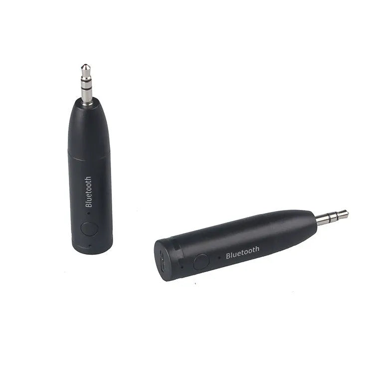 Black Bluetooth audio receiver for car stereo with AUX connection measuring 70mm by 14mm