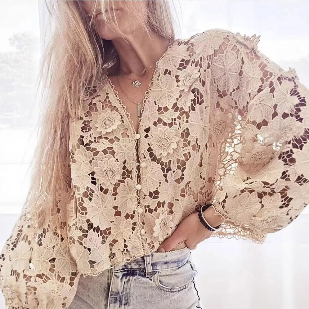 A loose-fit women's lace cardigan with a V-neck, long sleeves, and decorative 3D lace flowers, shown in khaki.