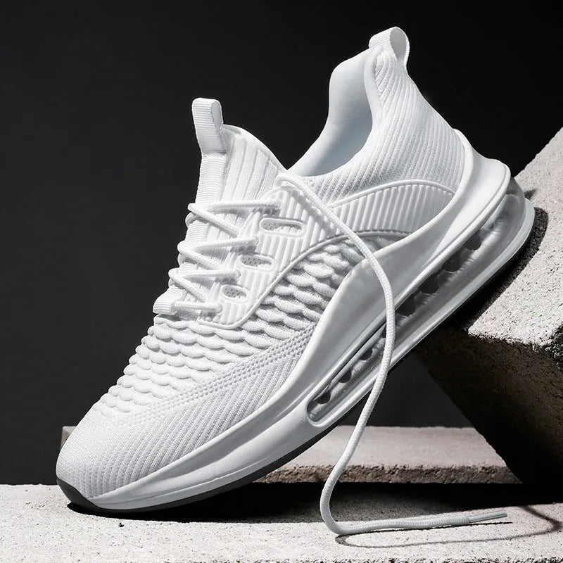 Men's low-top black breathable mesh running sneakers with white rubber sole on a solid background.