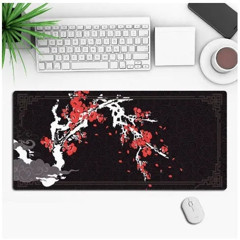 Anime design gaming mouse pad with non-slip rubber base shown on a desk
