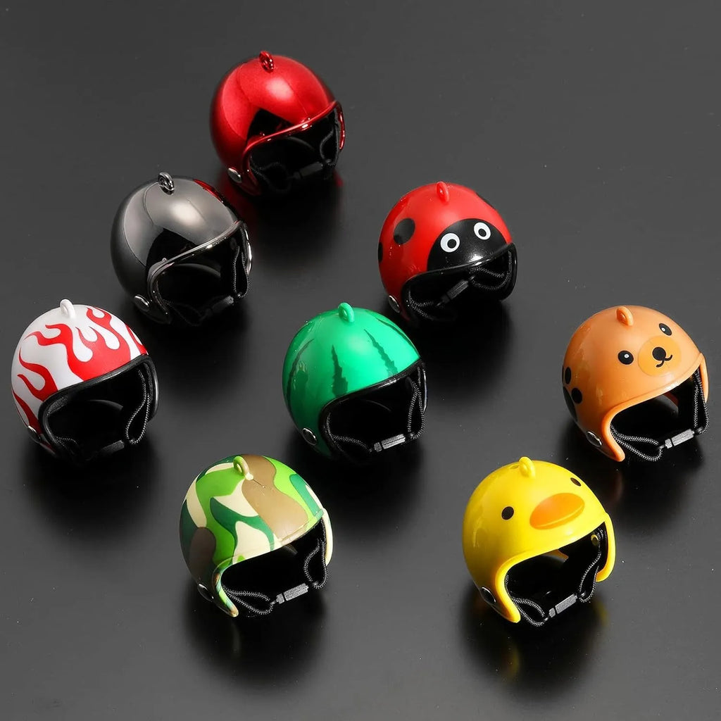 Small colourful plastic helmet with elastic straps, designed for a chicken or small bird to wear.