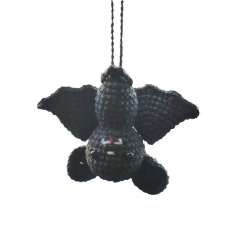 Plush hand-woven polyester car hanging ornament in a cartoon design, such as a bat, ghost, or pumpkin.