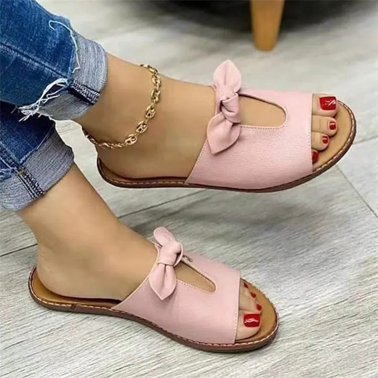 Women's casual sandals with bow detail on fish mouth open-toe design in black, pink and gold colours