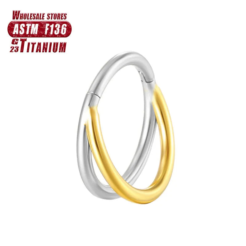 Titanium alloy fork prong nose ring on a white background, showing silver and gold colour options