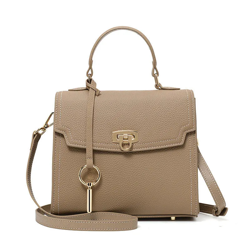 Elephant grey genuine leather crossbody bag with vintage lock and litchi pattern texture