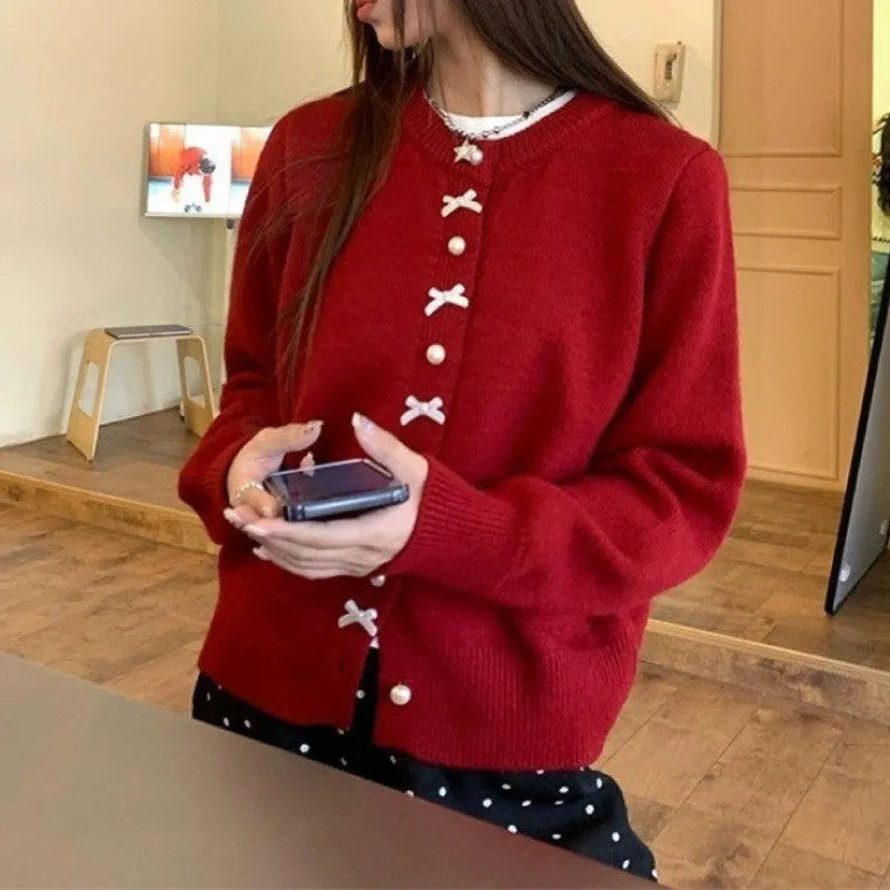 Women's cashmere cardigan sweater with pearl button bow detail in medium thickness for spring and autumn wear