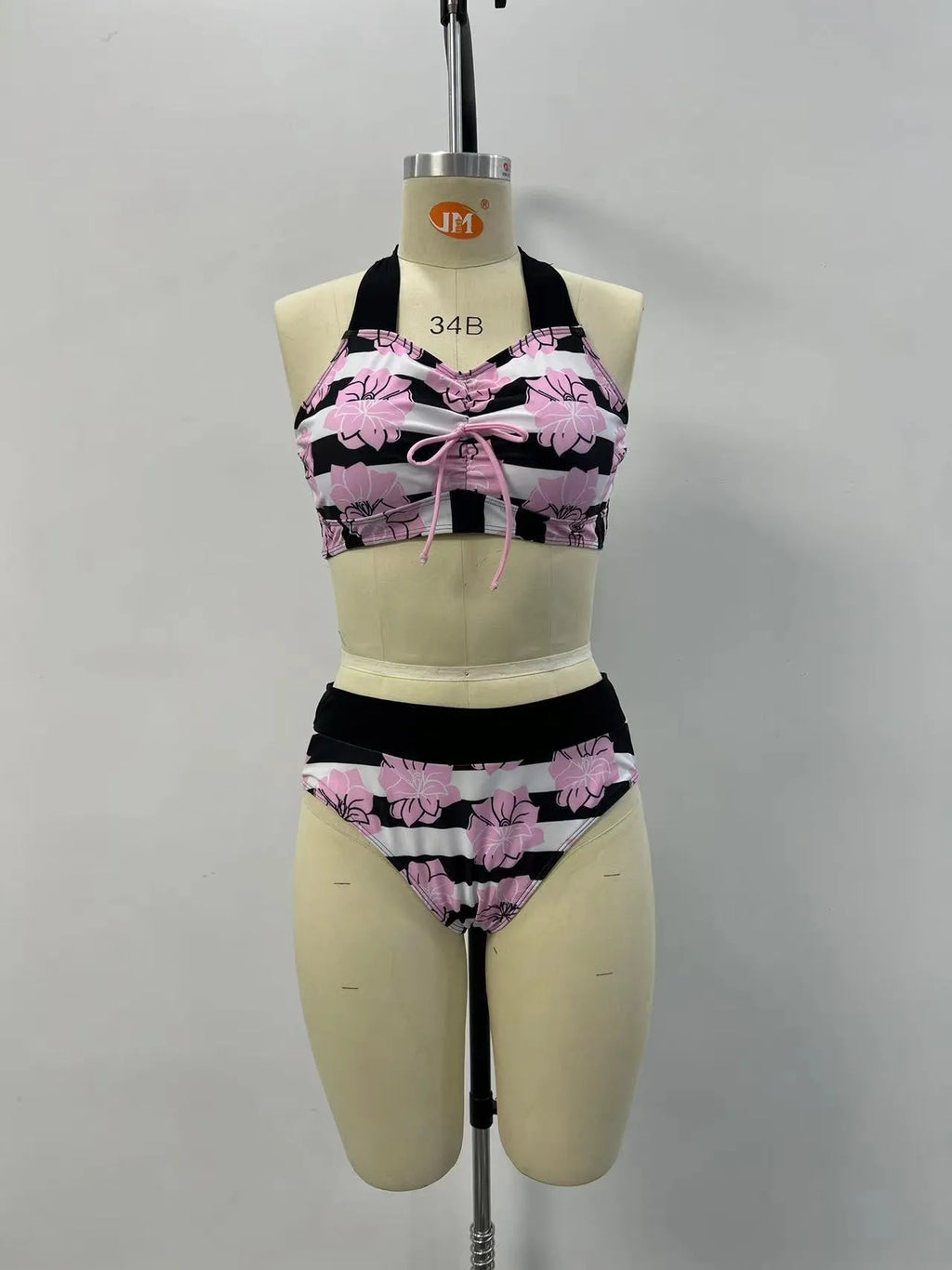 Black women's high-waisted bikini with a slimming belly-covered brief and split top.