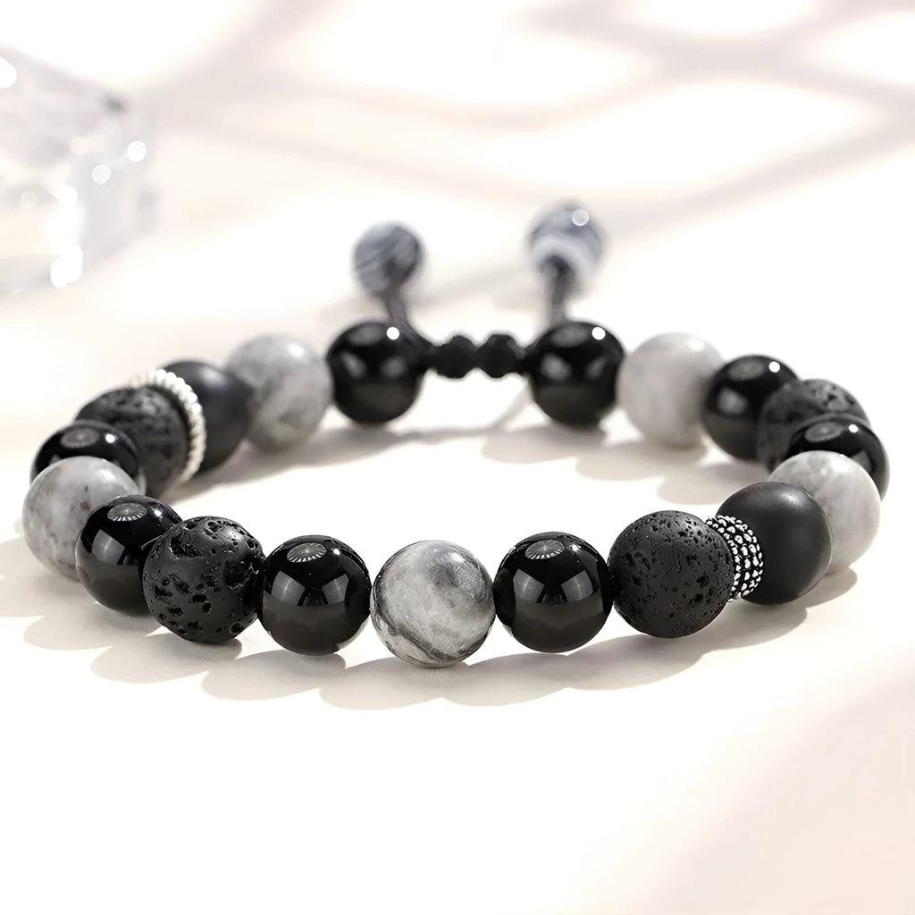 Black agate map stone and volcanic rock bracelet with diamond shaped beads in 8mm and 10mm sizes.