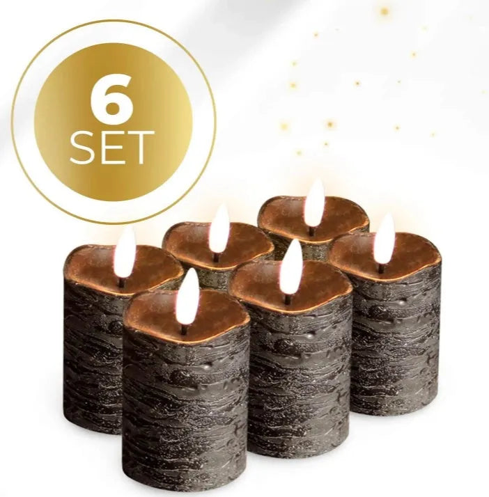 Set of four black flameless LED pillar candles with flickering flame effect on a wooden surface.