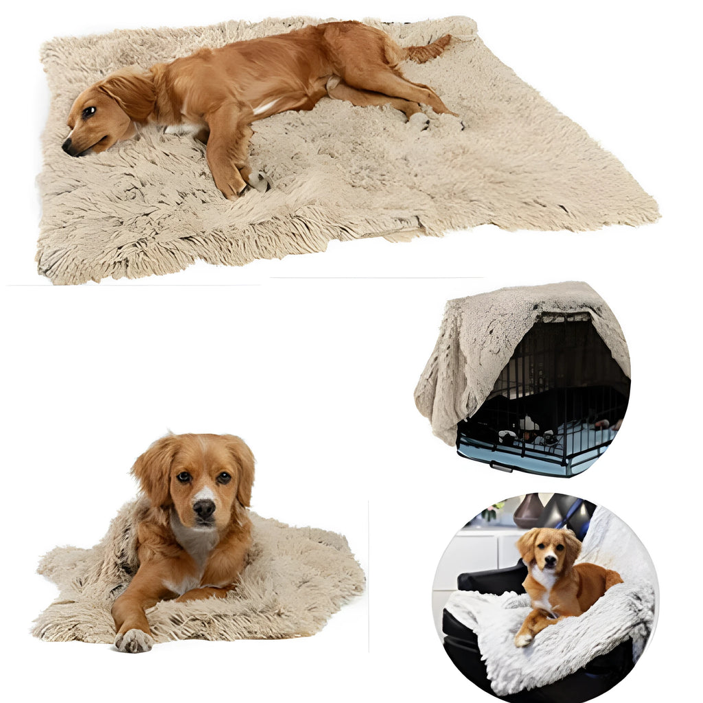 Soft grey plush dog blanket lying flat, showing its size next to a medium-sized dog kennel.