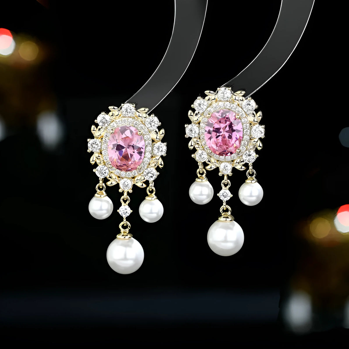 Oval geometric earrings with zircon inlay and tassel detailing in light purple, pink, and white colour options