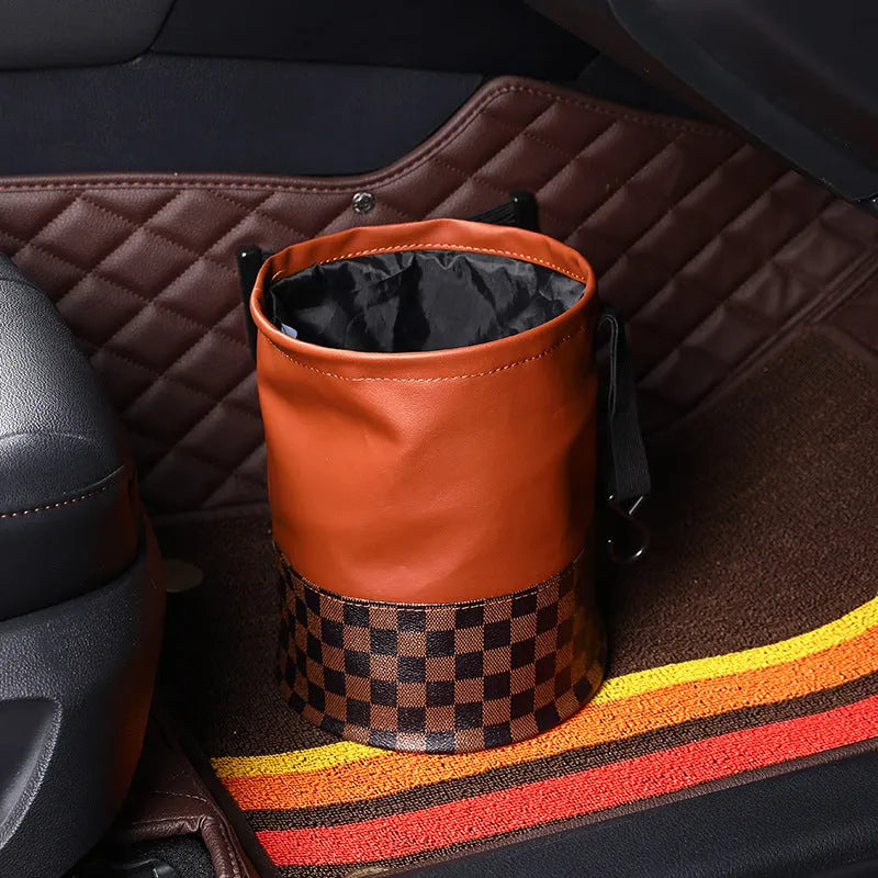 Retractable leather car interior bin showing waterproof construction with handle and folding mechanism
