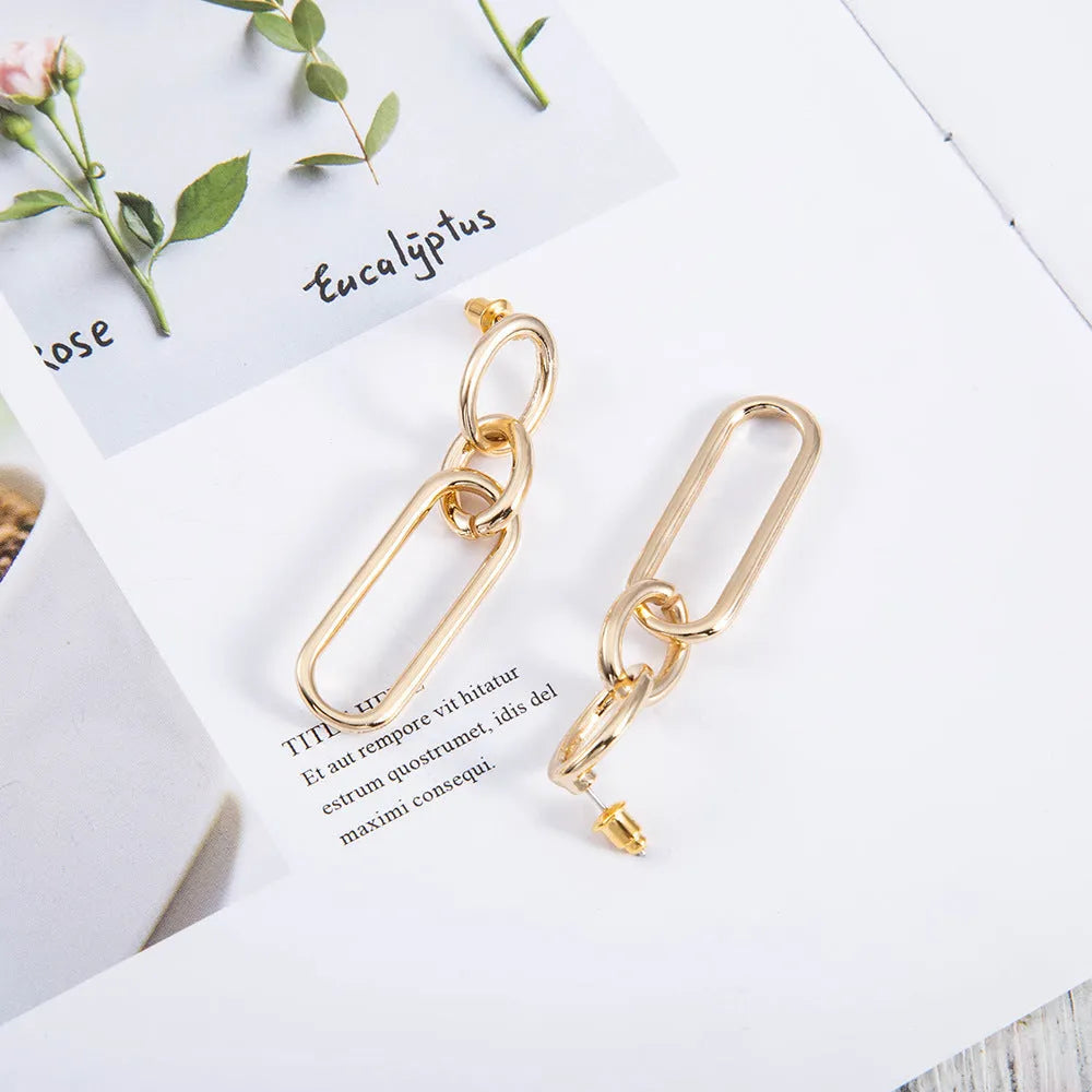 Sterling silver needle coloured geometric hoop earrings with ring and line design elements