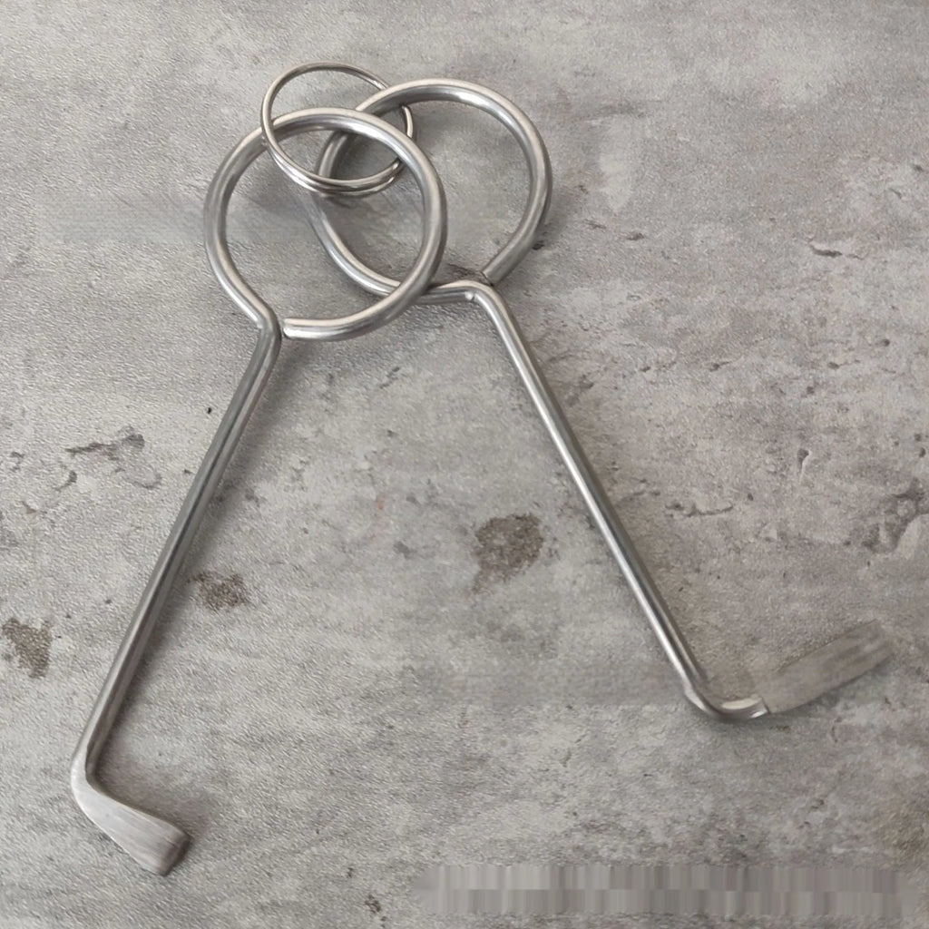 Two alloy wrench tools from a portable universal maintenance set.