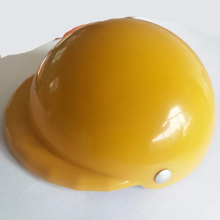 Plastic dog motorcycle cap helmet in assorted colours on a white background