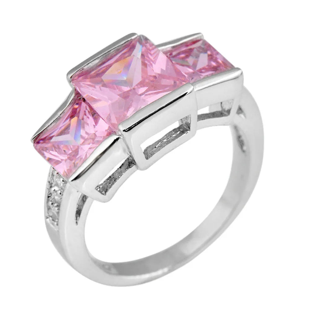 A set of colourful electroplated copper rings for women in sizes 6 to 10, showing apple green, champagne, and sapphire blue colours.