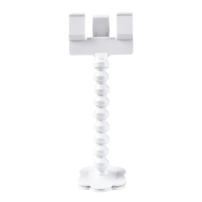 Black pet photography tool with rotating mount and phone clip for holding treats during animal photoshoots
