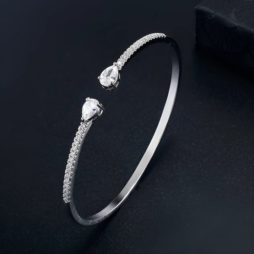 Personalised copper bracelet with multi-zircon inlay in white or blue colour option.