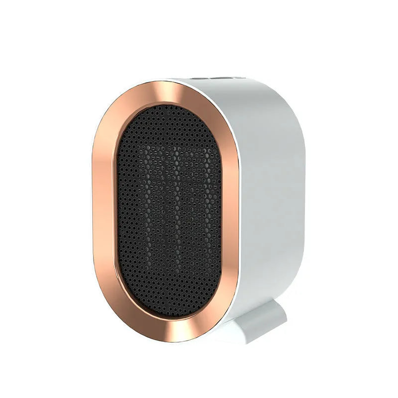 Desktop electric ceramic heater in various colours with mechanical controls and compact portable design